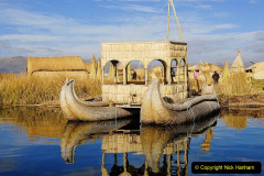 Houses and boats on the floating islands, lake Titicaca, Peru