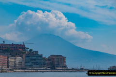 A picture of some buildings in the San Ferdinando district with Mount Vesuvius in the back (Naples).