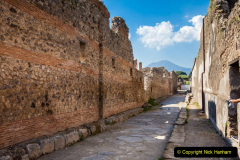 The streets of Pompeii made of large blocks of black volcanic rocks