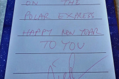 042.2023-12-29-Swanage-Railway-Polar-Express.-42-Your-Hosts-letter-to-Santa