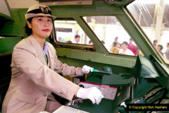 OSAKA, JAPAN:  Rumi Yamashita, Japan's first female bullet train driver, operates the super fast 'shinkansen' train leaving Osaka station headed to Hakata station in Fukuoka, western Japan 18 August 2000.  Yamashita, age 27, and Miyuki Fukuzawa, age 29, received their JR West shinkansen operating licenses for the first time in Japan's male-dominated society.   (ELECTRONIC IMAGE)   AFP PHOTO (Photo credit should read AFP via Getty Images)