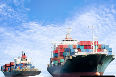 Container Cargo ship in the ocean with Birds flying in blue sky, Freight Transportation.