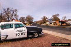 Seligman, Arizona, USA - January 2, 2018 : Vintage Chrysler New Yorker police car parks on historic route 66 in Arizona.