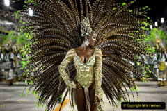 A reveler of Imperatriz Leopoldinense samba school performs during the second night of Carnival parades at the Sambadrome in Rio de Janeiro.