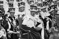 Prince Henry, 1st Duke of Gloucester (1900-1974) amongst an array of coronets during the Coronation of George VI in Westminster Abbey, 12th May 1937. The Duke of Gloucester was the third son of King George V and Queen Mary, brother of King George VI, and uncle of Queen Elizabeth II. He served as Governor-General of Australia (1945-1947). (Fox Photos/Getty Images)
