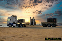 truck loaded parked by the seaside beach at sunset